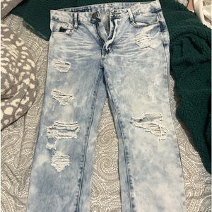 Distressed blue jeans